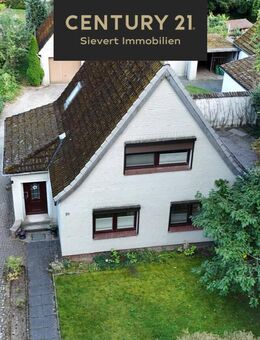 Einfamilienhaus mit Nebengebäude und Garage - Scheeßel