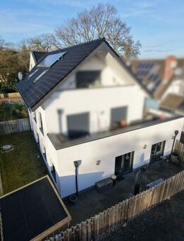 IMMOBILIEN GUMNIOR präsentiert: barrierefreie, neuwertige 3-Zimmer-Erdgeschosswohnung mit PKW Stellplatz und Garten - Spelle