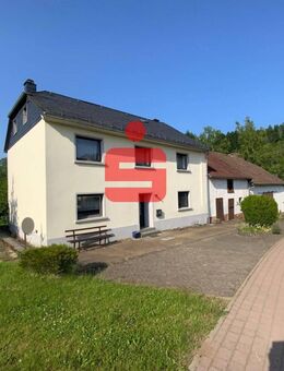 Einfamilienhaus mit Nebengebäuden auf großem Grundstück - Sellerich