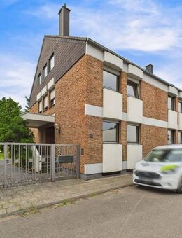 Repräsentatives Mehrfamilienhaus mit Gewerbeeinheit auf parkähnlichem Grundstück! - Düren