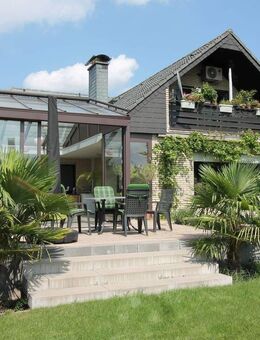 Bungalow mit Einliegerwohnung im Dachgeschoss, Rheinberg-Ossenberg - wunderschön gelegen, mit großem liebevoll angelegtem Garten - Rheinberg