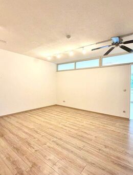 AIGNER - WG-geeignete 3-Zimmer-Erdgeschosswohnung mit Einbauküche und ebenerdiger Dusche - München