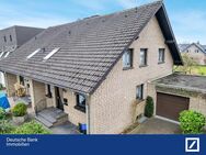 Gepflegte Doppelhaushälfte mit Fußbodenheizung (EG), saniertem Dach und einer Garage in ruhiger Lage - Lippstadt