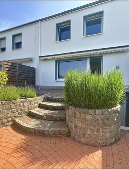 Platz für Ihre Familie: Reihenmittelhaus mit schönem Garten und Garage in Lippstadt-Süd - Lippstadt