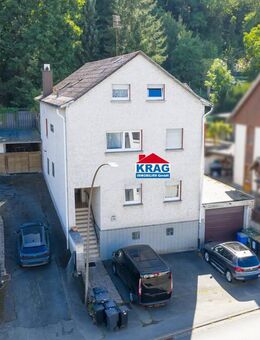 ++ KRAG Immobilien ++ Solides Anlageobjekt mit Garage und Teilkeller | vermietet | provisionsfrei - Gladenbach