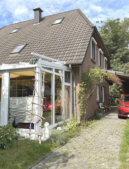 PURNHAGEN-IMMOBILIEN - Gepflegte Doppelhaushälfte mit Carport in ruhiger Lage von Bremen - Farge - Bremen