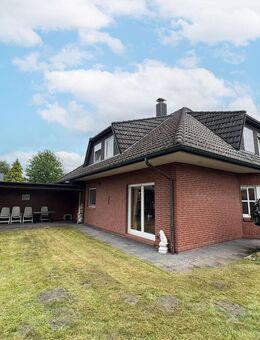 Vielseitiges Einfamilienhaus mit Einliegerwohnung und zwei Terrassen - Moorrege