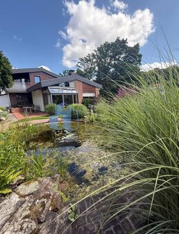 Vielseitiges Ein-Zweifamilienhaus mit Gartenidylle in schöner Lage von Trendelburg - Trendelburg