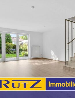 Großenkneten-Huntlosen | Geräumiges Reihenmittelhaus auf 3 Ebenen mit Carport und kleinem Garten - Großenkneten