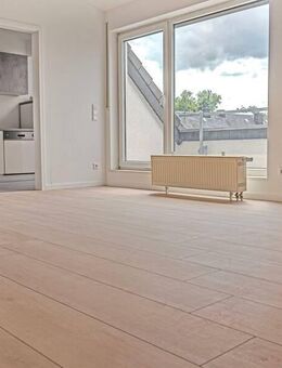 Gemütliche DG-Wohnung mit Einbauküche, Balkon und Tiefgaragenstellplatz - Mayen