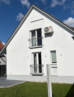 Einfamilienhaus mit vermietetem Gewerbeanteil - Landshut
