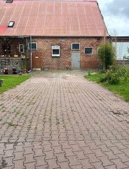 Einseitig angebautes Einfamilienhaus mit Teilkeller in Toddin OT Gramnitz Hof - Toddin