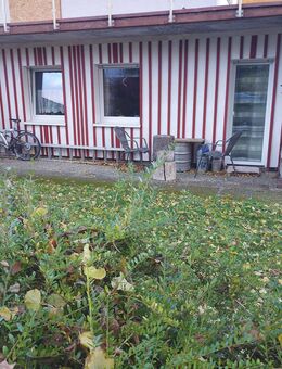 Top-Gelegenheit! Schöne Eigentumswohnung mit Terrasse und Garten in Burgsponheim zu verkaufen - Burgsponheim