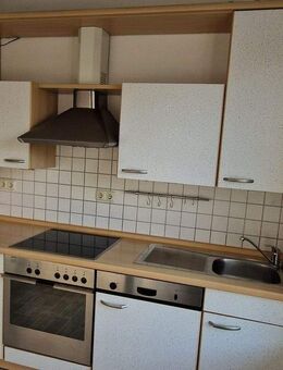 Schöne 3-Zi.-Whg. über 2 Ebenen mit Südbalkon - Bücken