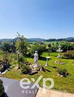 Qualität, die überzeugt: Lärchenfassade, Fußbodenheizung und günstige Energiebilanz - Hinterschmiding