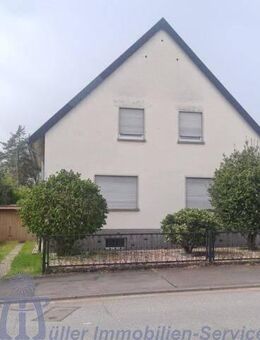 Freistehendes gepflegtes Einfamilienhaus in schöner Stadtrandlage von Homburg - Homburg