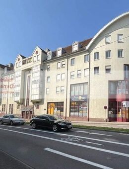 Zentrumsnahe 4-Zimmer-Eigentumswohnung mit Balkon und Tiefgarage - Rastatt