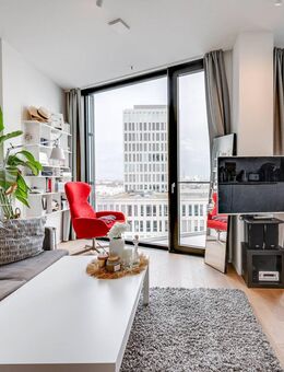 AIGNER - Modernes Wohnen im FRIENDS Tower: 1,5-Zimmer-Apartment mit einzigartigem Ausblick - München