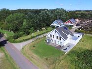 Einfamilienhaus und zwei Ferienhäuser mit Wasserblick - Wiek