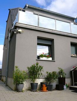 Exklusiv saniertes Einfamilienhaus mit PV-Anlage, Carport und modernster Ausstattung - Altlußheim