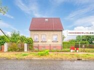 IMMOBERLIN.DE - Renovierungsbedürftiges Einfamilienhaus mit Nebengebäude & Garagen in familiärer Lage - Bernau (Berlin)