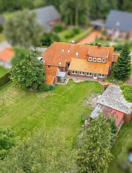 Nordsee-Nähe inklusive: Charmantes Zweifamilienhaus mit Ferienwohnung und großem Garten - Dornum