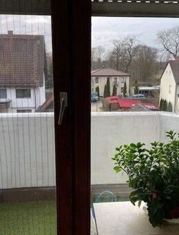 Brück Immobilien - Schöne, vermietete 3 Zi.-Maisonettewohnung mit Balkon - Haimhausen