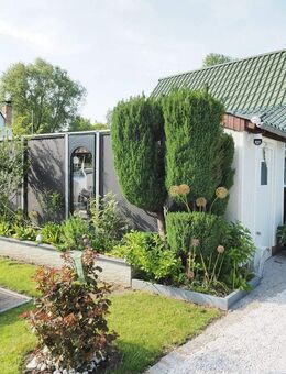 Zu verkaufen: Ferienhaus mit idyllischem Garten und Pool - Stralsund