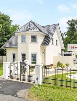 IMMOBERLIN.DE - Topzustand! Traumhaftes Haus mit Südterrasse, Sonnengarten, und Erdwärmepumpe in ländlicher Lage - Am Mellensee
