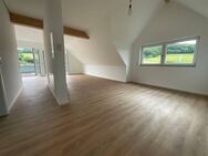 Erstbezug: 3-Zimmer Wohnung mit herrlichem Fernblick und Freisitz! - Sulzbach (Main)
