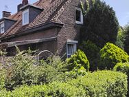 ***BÜSCHER IMMOBILIEN*** Charmantes, vermietetes, teilweise renoviertes und modernisiertes Reihenendhaus mit Garage - Gronau (Westfalen)