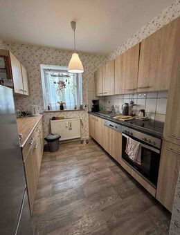 Zentrumsnahe Eigentumswohnung mit eigenem Garten und Balkon - Beckum