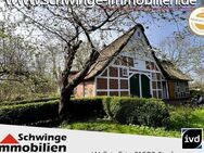 SCHWINGE IMMOBILIEN Stade: Reetdachhaus mit viel Charme in der Ortschaft Oederquart / Nähe Elbe - Oederquart