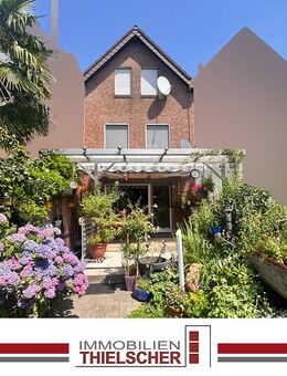 Familienfreundliches Reihenmittelhaus mit Tiefgarage und Garten in ruhiger Lage von Scherpenseel - Übach-Palenberg