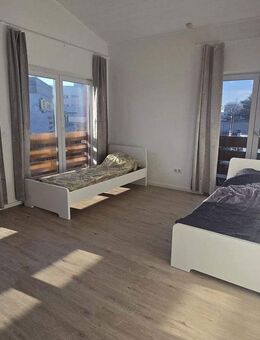 Freistehendes Mehrfamilienhaus mit 6 Wohneinheiten, Monteurunterkunft, Teilvermietung möglich - Ergolding