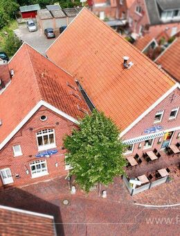 Anlageobjekt mit Garagen, Stellplätzen und Ausbaureserve mitten im Fischerdorf Ditzum - Jemgum