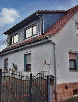 Einfamilienhaus mit 2 Wohneinheiten im Nebengebäude und Ausbaupotential für eine weitere Einheit - Bad Nauheim