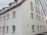 Erstbezug: 2-Zimmer-Wohnung EG mit Einbauküche, Terrasse, Dusche, Pkw-Stellplatz u. Kellerabteil direkt am Löpsinger Tor - Nördlingen