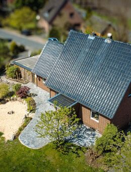 Grünes Wohnglück: Freistehendes Einfamilienhaus mit Traumgarten am Waldrand - Kutenholz