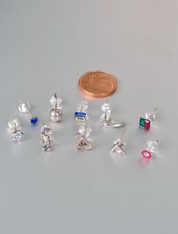 (452) 10 schöne einzelne Ohrstecker in Silber - Geesthacht