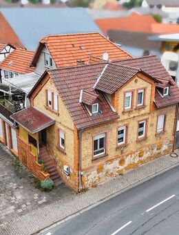 Großzügiges Mehrfamilienhaus mit 3 Wohneinheiten, Gewerbeflächen, Gartenidylle & Potenzial - Hasselroth