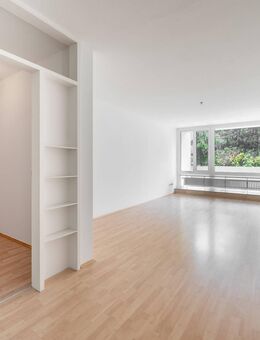 AIGNER - Sanierte 3-Zimmer-Wohnung mit großzügiger Süd-West Terrasse in Moosach - München