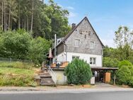 Freistehendes Einfamilienhaus mit Einliegerwohnung und Bauland in Mechernich - Mechernich