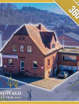 Großes Mehrfamilienhaus mit 2 Wohnungen, 2 Gewerbeeinheiten und Entwicklungspotenzial - Bruchweiler-Bärenbach