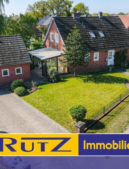 Ganderkesee-Heide | Gepflegtes Siedlungshaus auf schönem Eckgrundstück mit Garage und viel Potential - Ganderkesee
