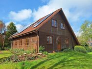 Zauberhaftes Holzbohlenhaus mit Einliegerwohnung in Mohrkirch - Mohrkirch