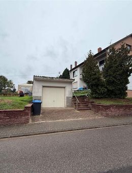 Vermietetes Zweifamilienhaus mit Garten und Garage in 66787 Wadgassen/Differten zu verkaufen - Wadgassen