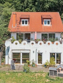 Charmantes Einfamilienhaus mit Einliegerwohnung und fabelhaftem Ausblick in Gründau - Gründau
