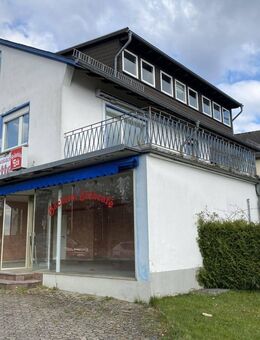 Mehrfamilienhaus mit Ladengeschäft und Halle - Holzappel