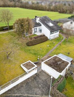 Wohnhaus mit großzügiger Architektur in traumhafter Lage - Hünfelden
